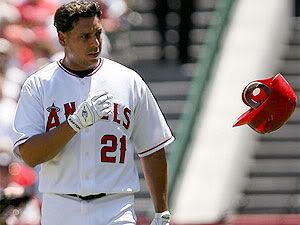 Juan Rivera tosses helmet