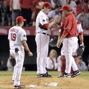 John Lackey hands over the ball